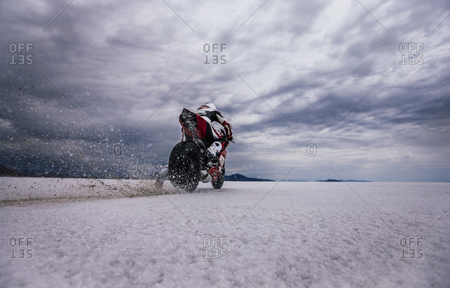 Bonneville Salt Flats, Utah, USA - August 25, 2014: Man riding his motorcycle on the bonneville salt flats, utah, usa