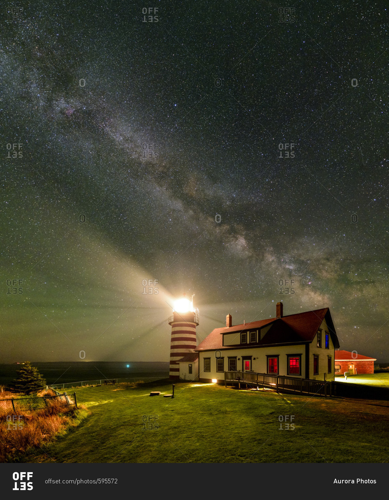 A vertical panorama of the Milky Way over West Quoddy Head Lighthouse in Maine.