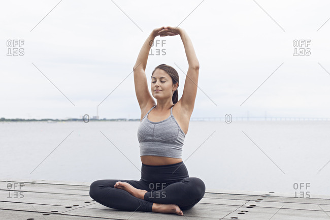 Raised arms pose Cut Out Stock Images & Pictures - Alamy