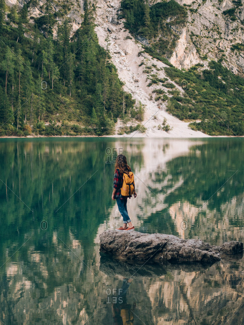 Woman with backpack in nature