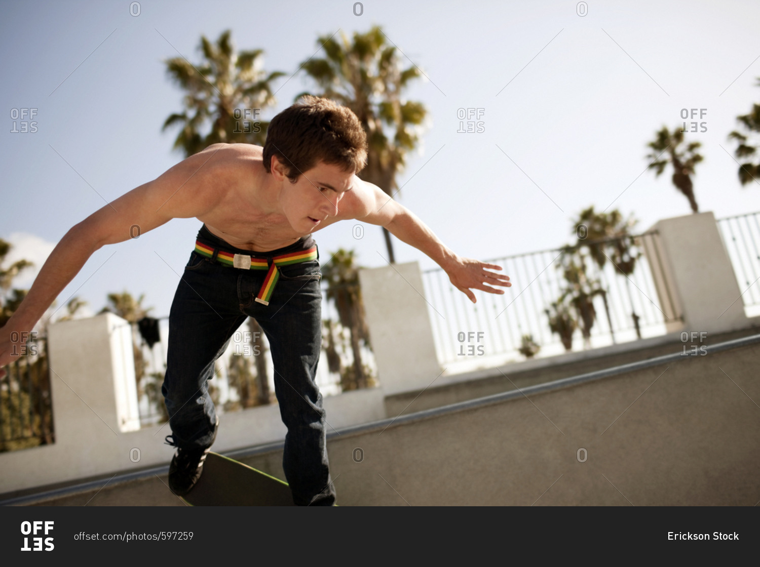 A skateboarder on a skateboard ramp