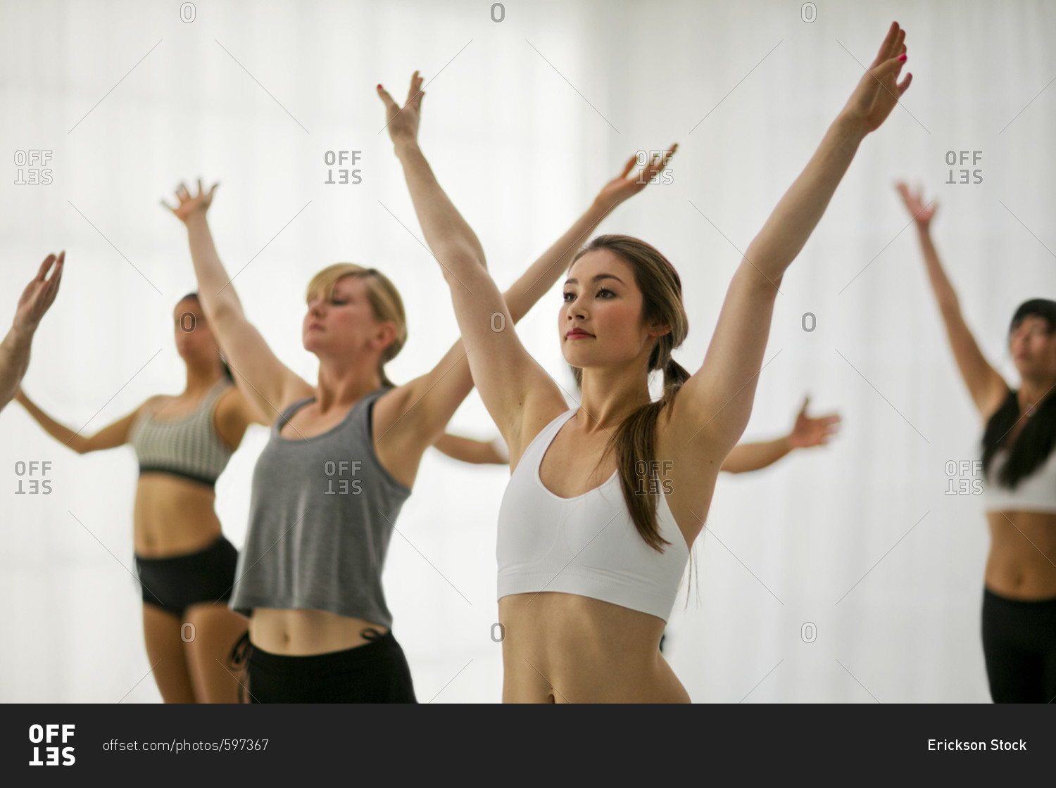A group of people in a yoga class