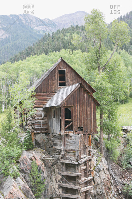 Old wood building on mountain rock
