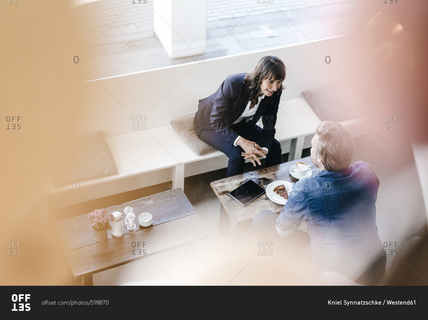 Businesswoman having a meeting with client in a cafe