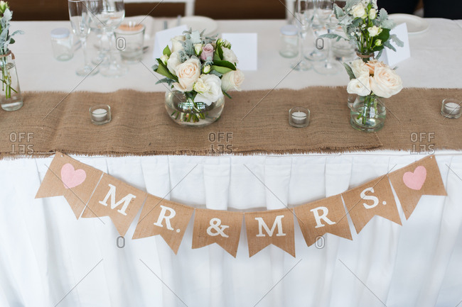 Wedding pennant banner with Mr. and Mrs. on the sign
