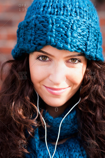 Young woman hearing music portrait