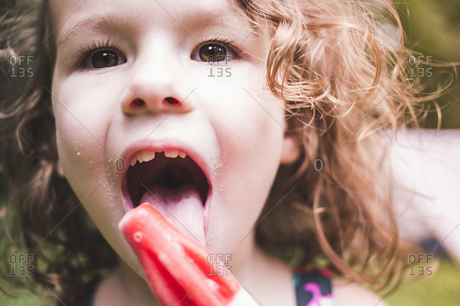 Young Girl Licking