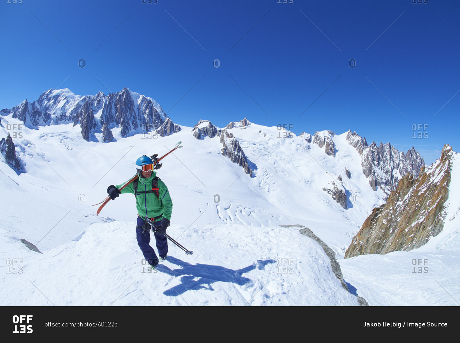 Mature male skier on ridge at Mont Blanc massif, Graian Alps, France