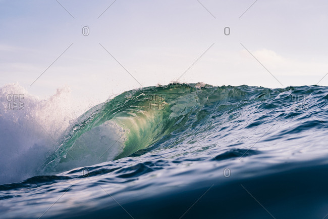 Curling green ocean wave in Bali