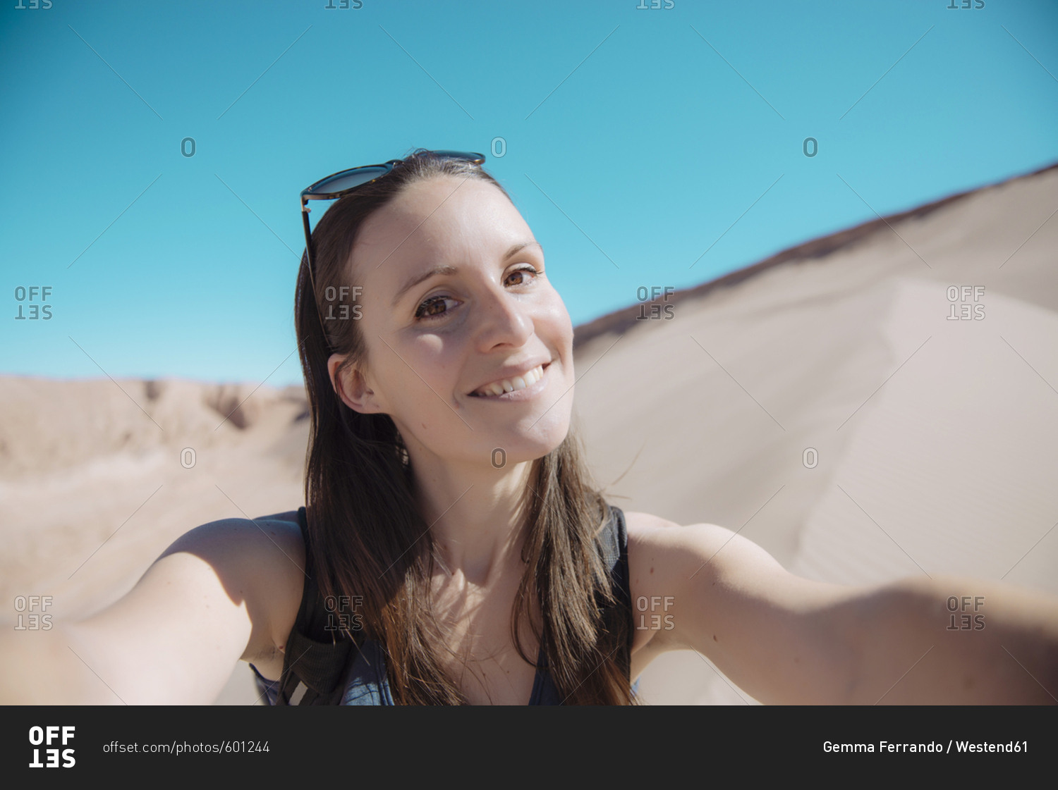 Chile- Atacama Desert- portrait of smiling woman taking selfie