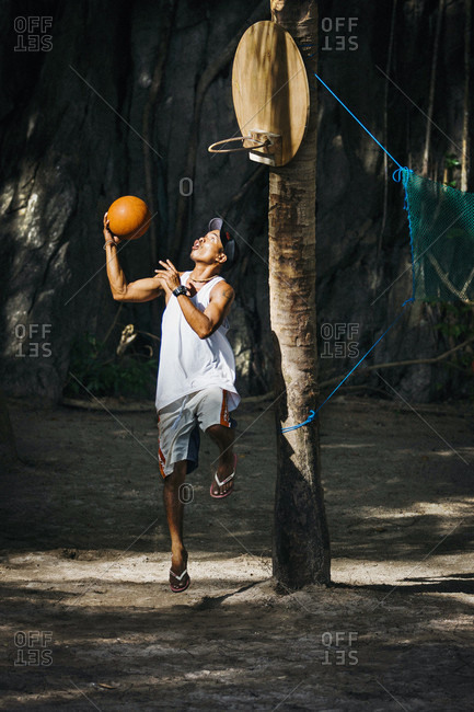 El Nido, Palawan, Philippines - November 17, 2016: Man Playing Basketball On The Beach In Philippines