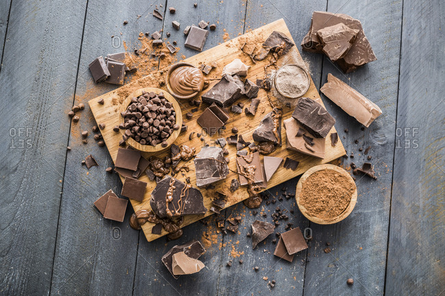 Various chocolate pieces on cutting board