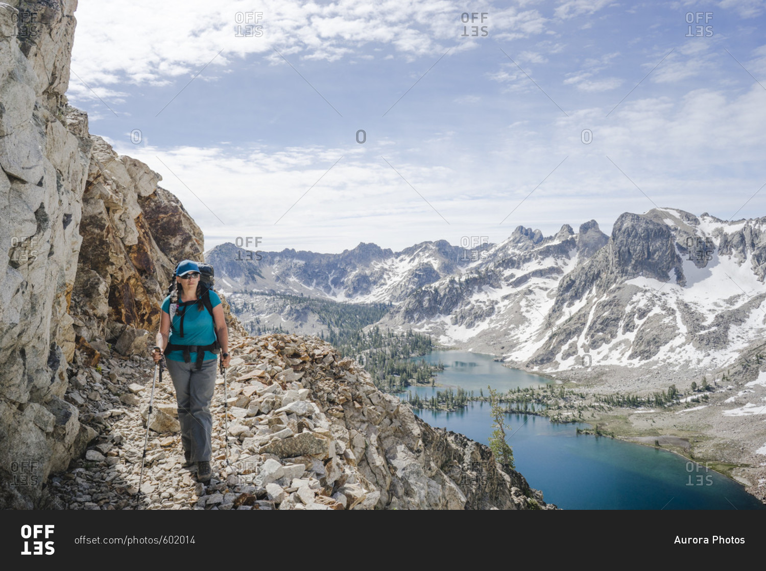Female backpacker nears Snowyside Pass above Twin Lakes in the Sawtooth Mountains, Idaho