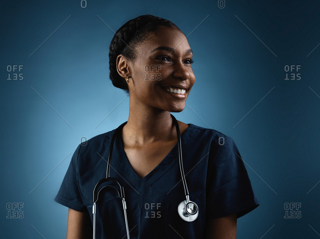 Grinning healthcare worker in portrait