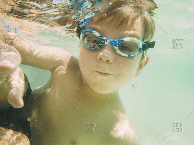 Portrait Of Boy Swimming Underwater Stock Photo Offset