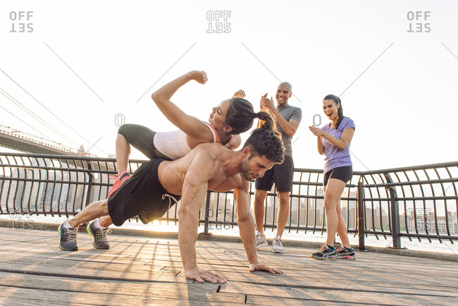 push ups with girl on back