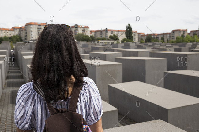 Woman at a Holocaust memorial in Berlin, Germany