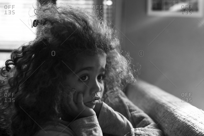 A tired toddler with messy hair