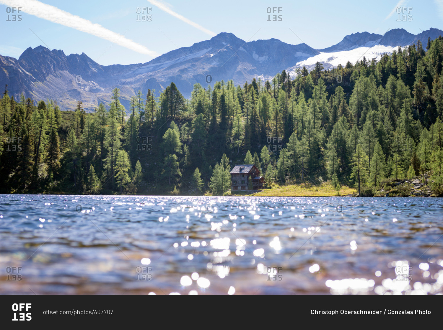 Austria, Lake Reedsee - August 30, 2015: Crystal clear water in the mountain lake Reedsee in Bad Gastein. The area is popular for hiking, picnic and fishing