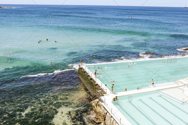 Australia, New South Wales, Bondi Beach - February 20, 2017: High angle view of people enjoying in infinity pool
