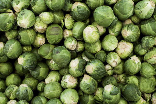 Many Brussels sprouts on display at farmers' market