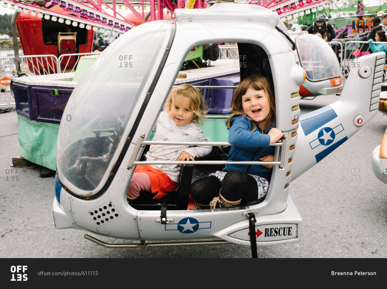 Girls on a helicopter ride stock photo - OFFSET