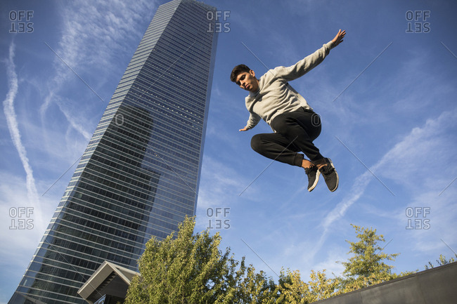 Man jumping during a parkour training