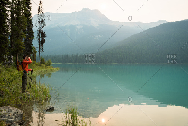 Hiker standing near the lake