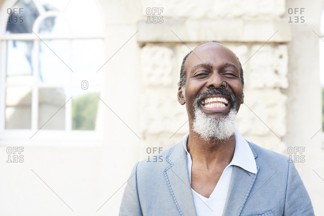 Portrait of laughing bearded man