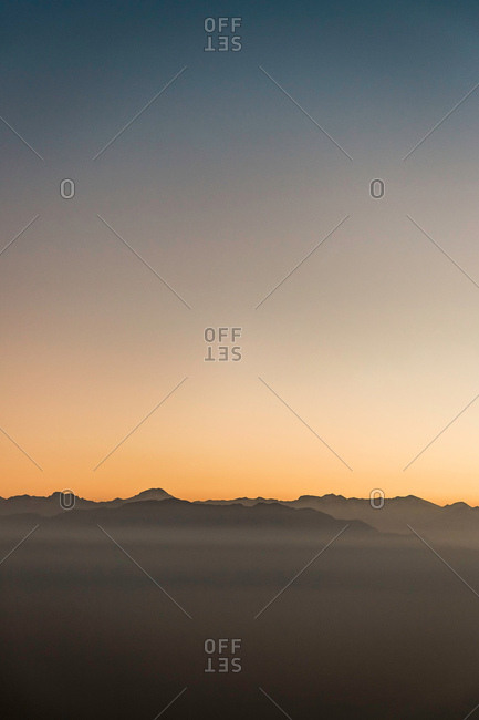 Aerial view of sunset over mountains, Metropolitan Region, Chile