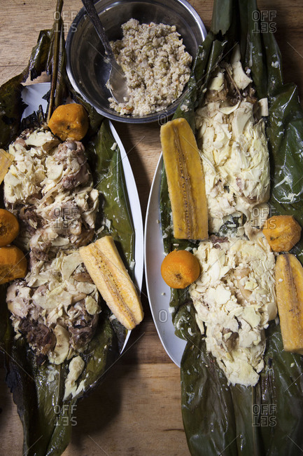 Charred banana leaf with fish and plantains
