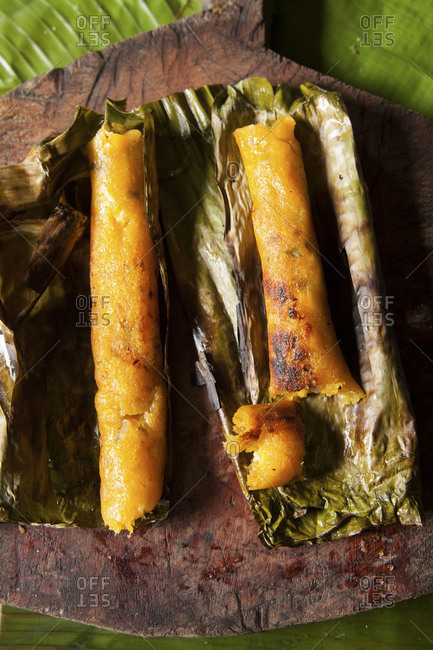 Two charred Ecuadorian corn cake tamale