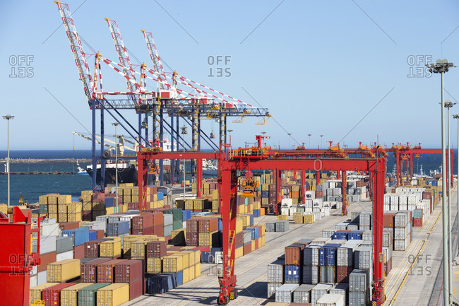 Cranes and cargo containers at commercial dock