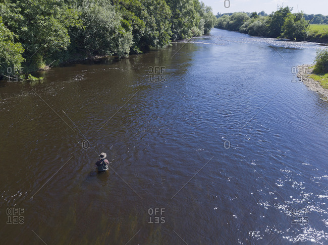 Aerial View Of Man Coarse Fishing In River Wye