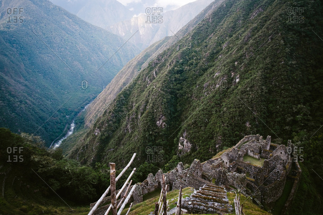 Ruins in valley of mountains, Peru