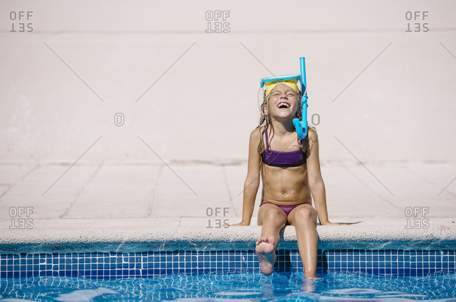 Kid playing in pool