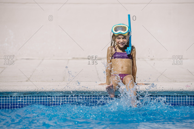 Kid playing in pool