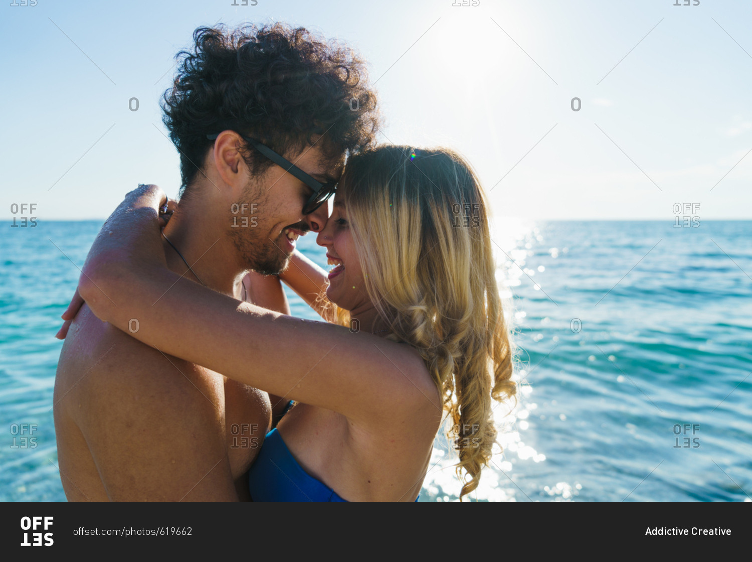 Loving couple posing on beach