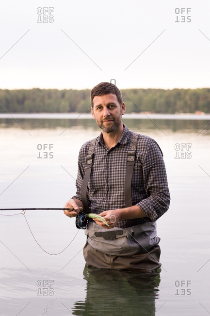 Fishing in waders Clearance