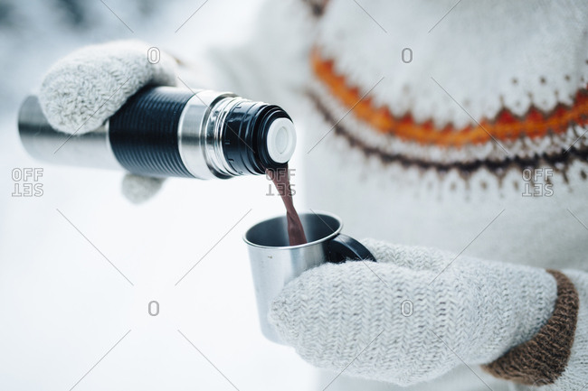 Mug And Thermos Of Hot Chocolate On A Cold Winter Day Stock Photo, Picture  and Royalty Free Image. Image 12627723.