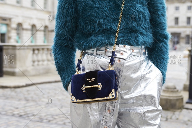 LONDON - 15 SEPTEMBER, 2017: Mid section detail of woman wearing Prada  clothes and handbag standing outside Somerset House, Day 1, London Fashion  Week. stock photo - OFFSET