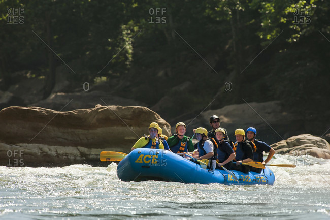 July 26, 2014: Order of the Arrow scouts make it through a rapids on the New River, during a whitewater adventure in the New River Gorge, near Fayetteville, outside of the Summit Bechtel Reserve (SBR), WV.  Right side of raft, front to backJimmy Register, Billy Meyers, videographer, Chris Gower.  Far side of raft, front to back -Ben Oswald, Michael McPherson, Tyler Ray (and raft guide at back). The OA scouts are participating in a service and adventure program at SBR.