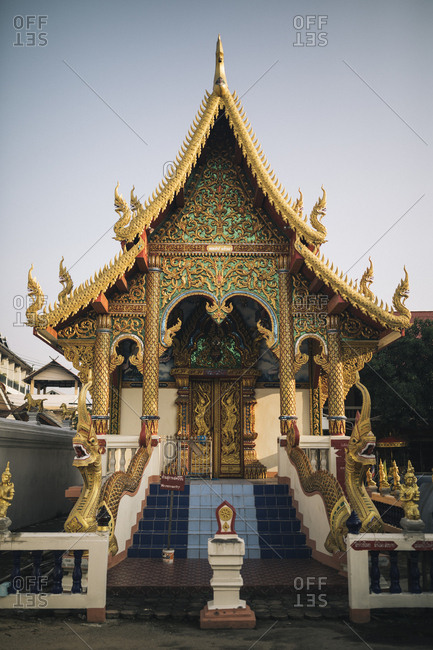 Chiang Mai, Thailand - May 20, 2017: Small golden temple in the Old Town of Chiang Mai, Thailand