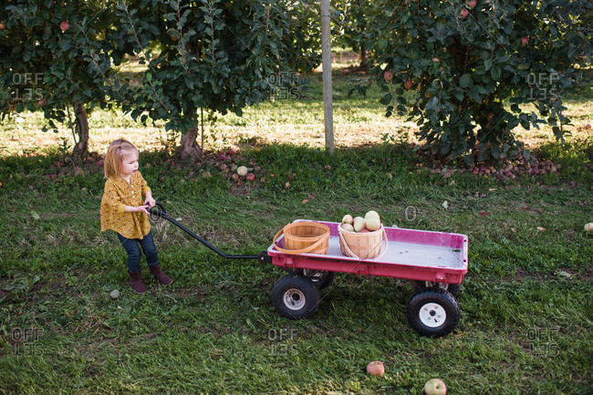 girl pulling wagon