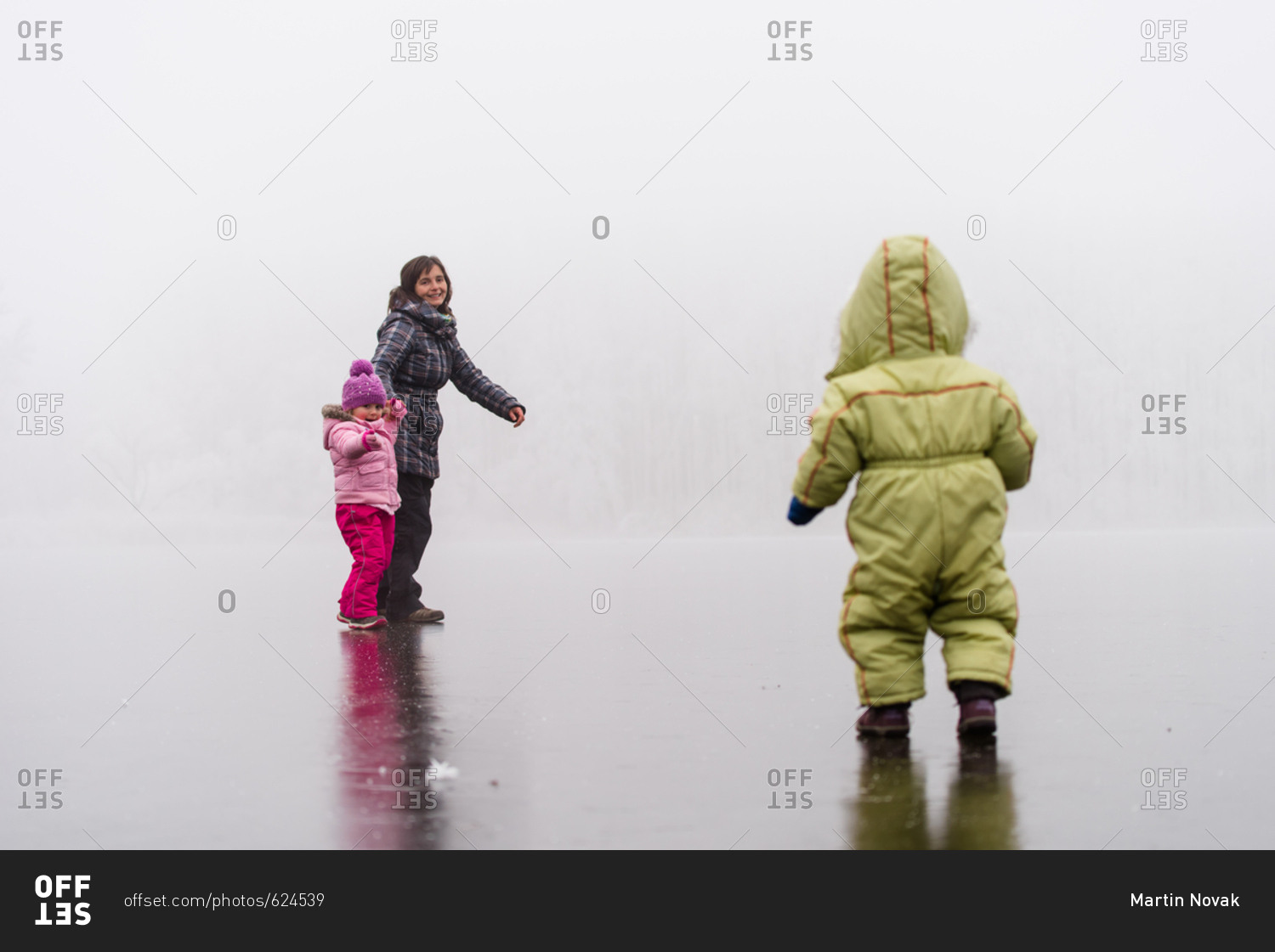 Mother enjoying outdoors with her kids - Winter season
