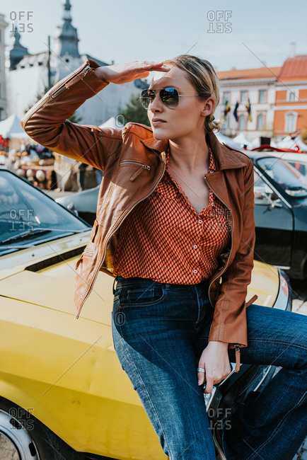 Little girl wearing aviator sunglasses stock photo - OFFSET