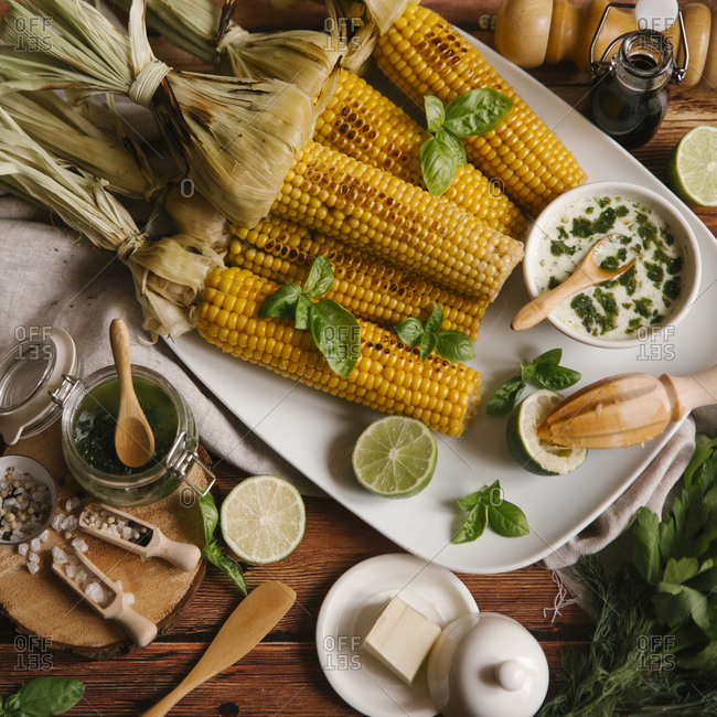 High angle view of roasted corn served in plate on table