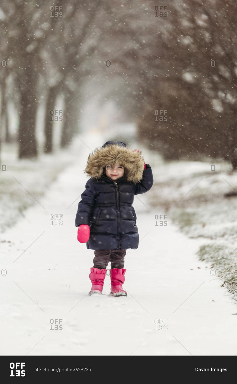 cute girl wearing hooded jacket 