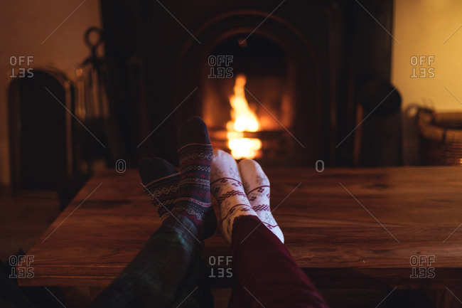 Featured image of post Couple Cuddling By Fireplace Tamara leicester of tamara heather interior design argues against placing a tv above the mantel and matt clawson of clawson construction argues in favor