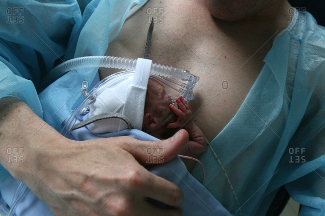 June 27, 2006: Hospital Robert Debre, Paris, France. Neonatology service, father and his premature child